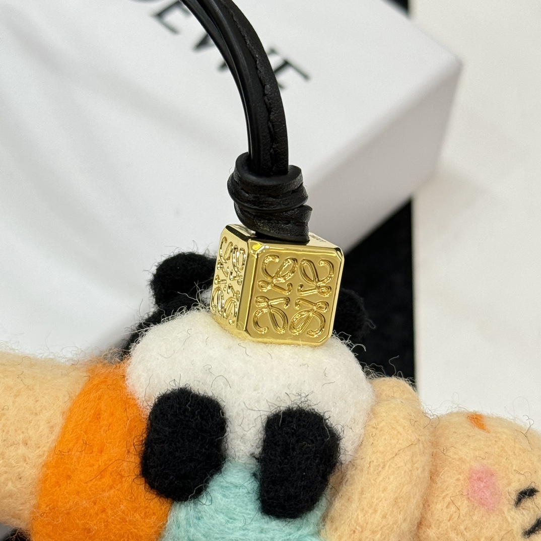 Loewe felt and cowhide panda and child charm