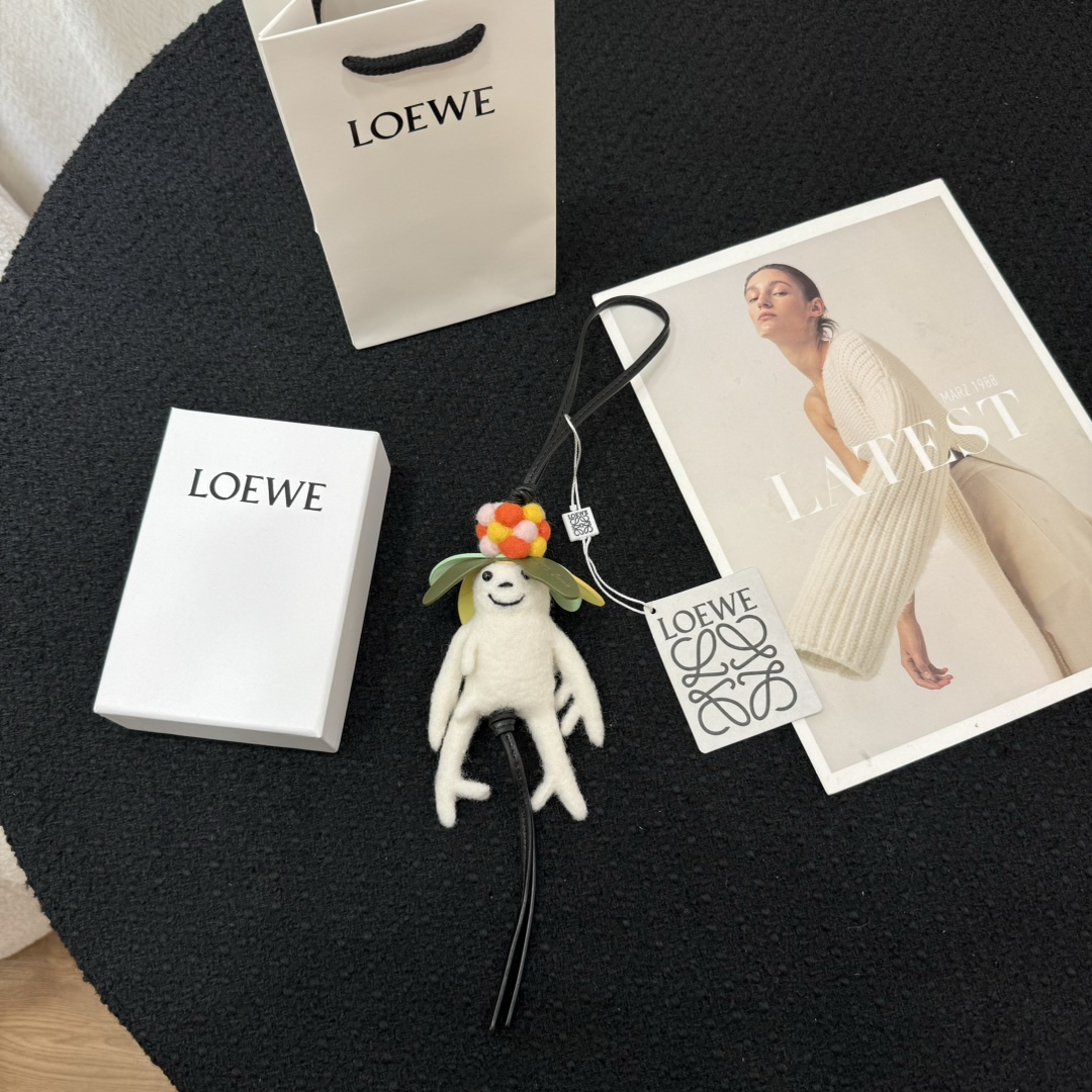 Loewe felt and cowhide mandrake charm