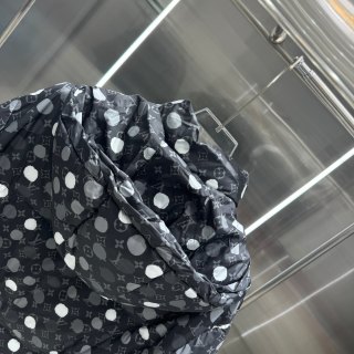 Co-branded Louis Vuitton hand-painted effect polka dot print down belted jacket