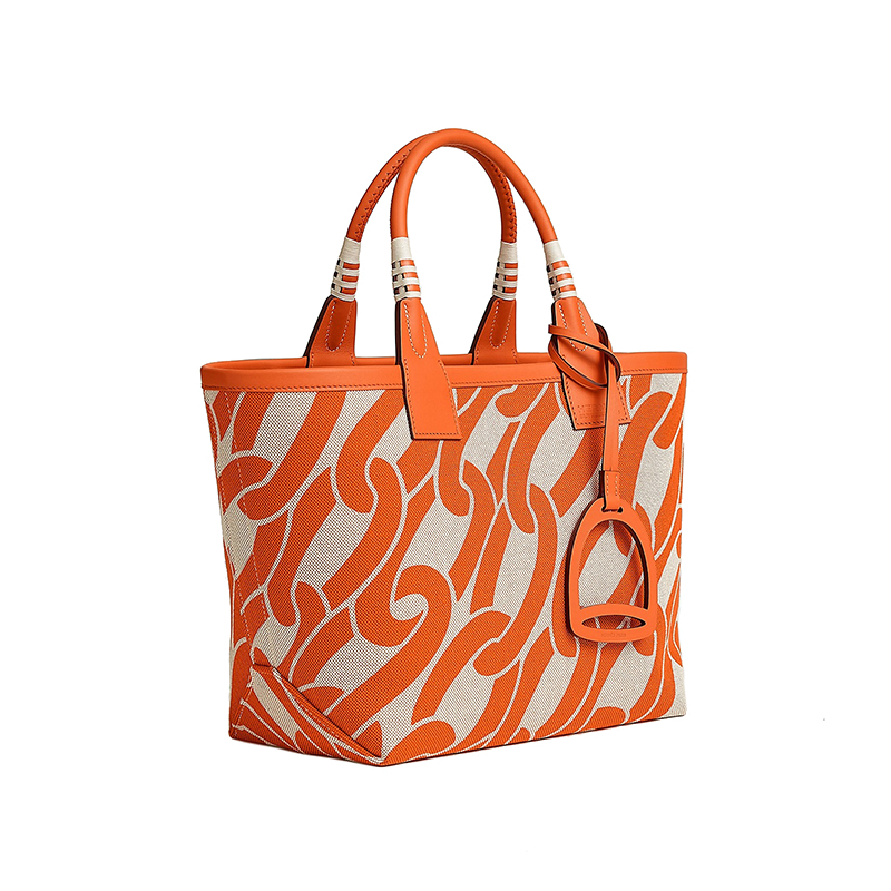 Hermes 24 new women's orange and white alternate canvas with leather stirrup handbag H084533CKAB